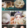 A collection of soft polymer clay sculptures, including a figure, a flower, and several doll-like figures.