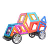 A colorful magnetic building tiles set shaped like a vehicle, featuring transparent and translucent plastic pieces.