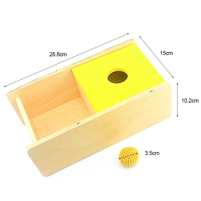 A wooden sensory toy set featuring a yellow insert in a light wood box with various dimensions marked.