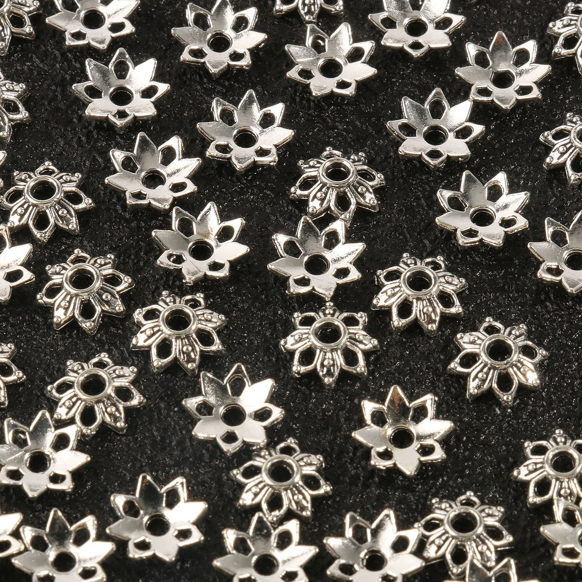 Silver hollow flower bead caps used for jewelry making