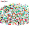 Assortment of colorful soft polymer clay slices for nail art and DIY crafts