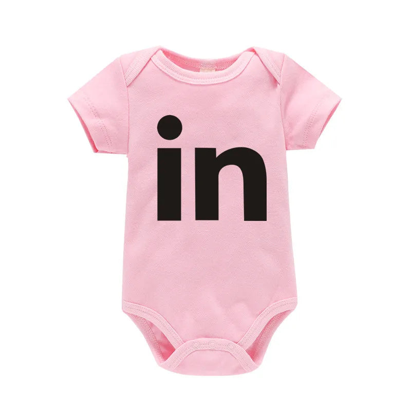 Pink letter print cotton baby bodysuit featuring the letters i and n