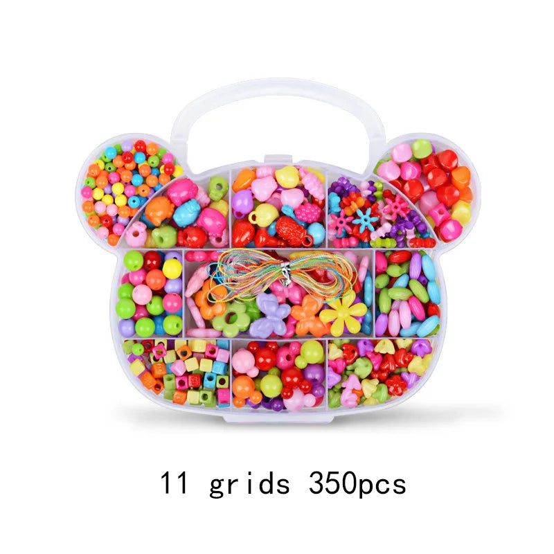 A clear plastic organizer holding 11 grids of assorted colorful acrylic beads for DIY craft projects