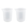 A pair of clear silicone resin mixing tool kit with measuring cups and stir sticks.