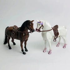 A pair of 1/12 scale dollhouse horse saddles and riding props, featuring a dark brown horse and a white horse.