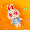 A white and pink rabbit figure made of building blocks is shown against an orange background.
