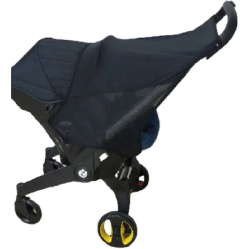 Black stroller accessory kit featuring a mosquito net, rain cover, and other components.