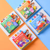 A colorful cloth book featuring various animal tails for baby sensory development displayed on a light background.