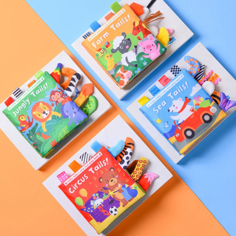 A colorful cloth book featuring various animal tails for baby sensory development displayed on a light background.