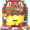 A Dinotrux toy truck car in red and yellow packaging featuring a dinosaur figure.