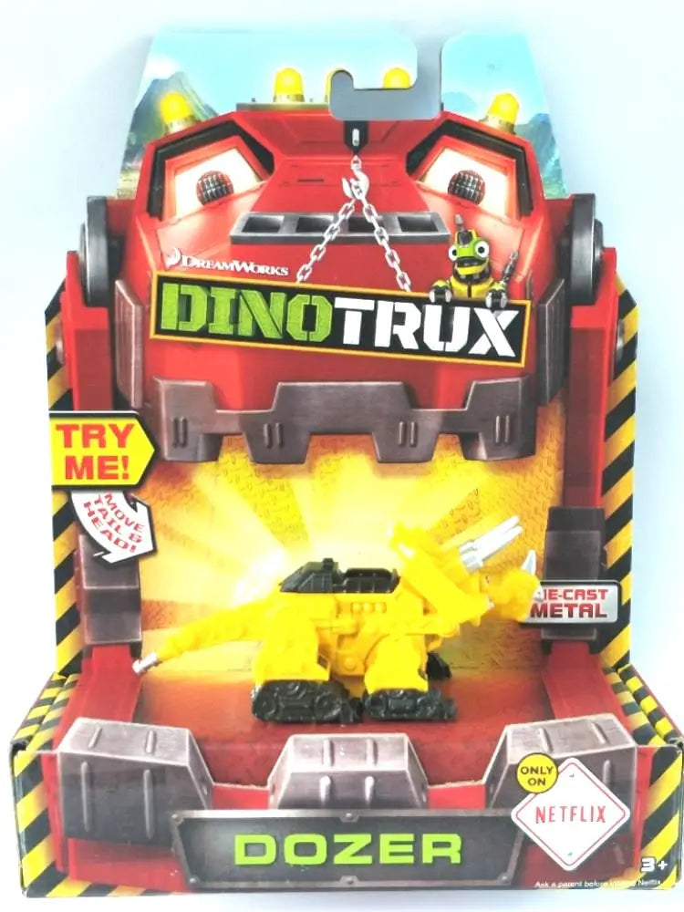 A Dinotrux toy truck car in red and yellow packaging featuring a dinosaur figure.