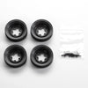 A set of black 1:12 scale RC car steering wheel and interior upgrade parts, including several circular components and a plast