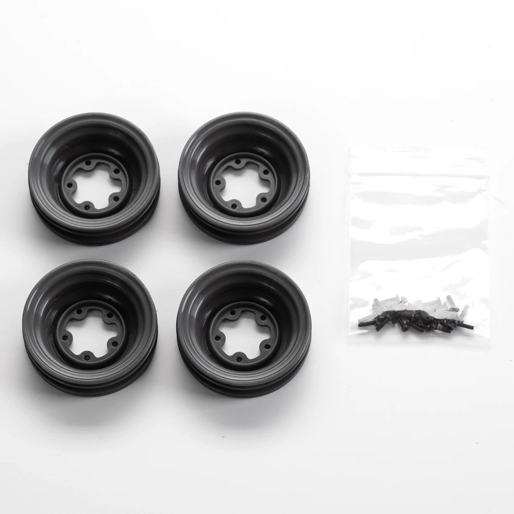 A set of black 1:12 scale RC car steering wheel and interior upgrade parts, including several circular components and a plast