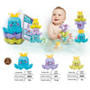 A set of boat-shaped stacking cups bath toys for toddlers in various colors including blue, purple, and yellow.