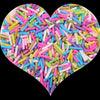 A heart shape filled with colorful soft polymer clay candy sprinkles for cake decorating