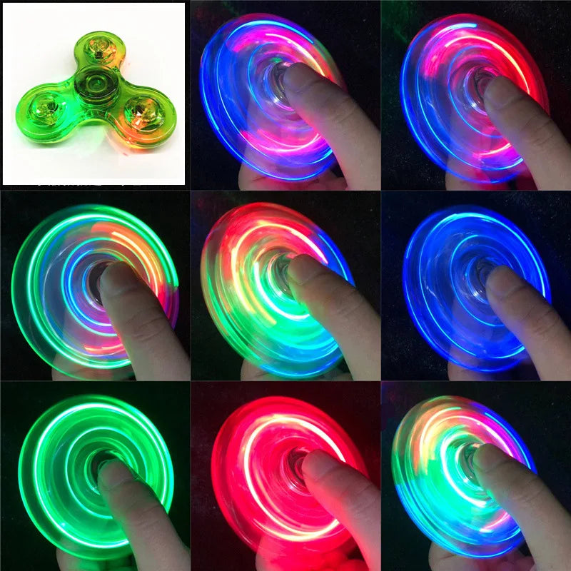 A collection of glow-in-the-dark LED fidget spinners demonstrating various colors and spinning motion.