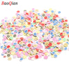 Assortment of colorful soft polymer clay slices for nail art and DIY crafts