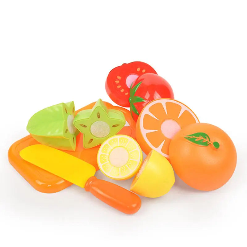 A set of colorful pretend play food toys including various fruits like tomatoes, oranges, and lemons.