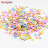 Assortment of colorful soft polymer clay slices for nail art and DIY crafts
