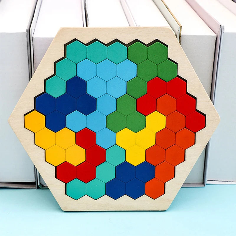 A wooden tangram puzzle board with a hexagonal shape filled with colorful puzzle pieces.
