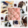 A collection of soft DIY mink fur pom poms in various shades of pink, black, and brown for crafts and accessories.