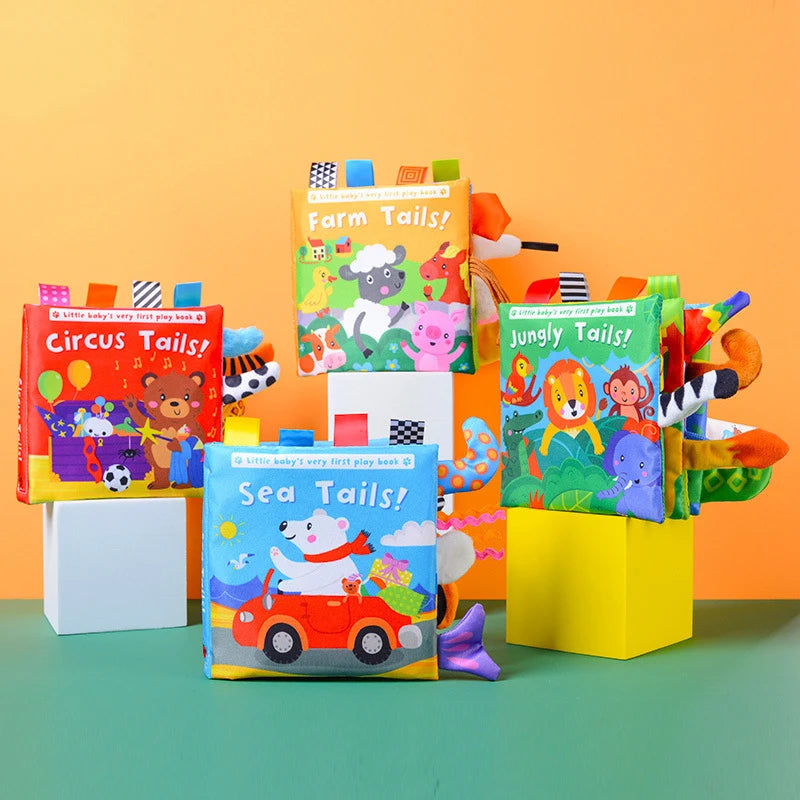 A colorful display of soft animal tails cloth books for baby sensory development featuring farm, circus, sea, and jungle them