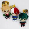 Three My Hero Academia plush figures featuring characters in yellow, white and red hair and costumes.