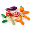 A wooden magnetic fruit and vegetable cutting play set featuring various colored fruits and vegetables like a purple eggplant