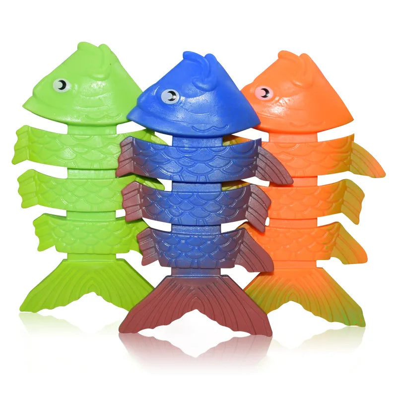 A set of four colorful plastic shark rocket pool diving toys in green, blue, orange, and pink.