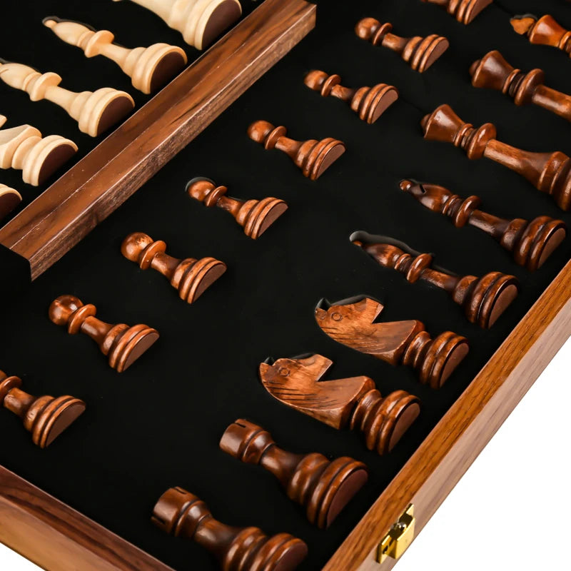 Handcrafted wooden folding chess set with solid walnut pieces displayed in a wooden box.