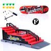 A finger skateboard park set featuring a red ramp and black board components.