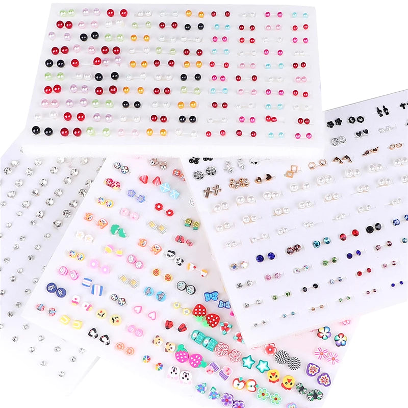 A collection of 100 pairs of assorted acrylic stud earrings featuring hearts, stars, moons, and various colorful designs.