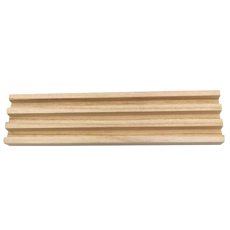 A wooden domino rack set of four premium tile holders for games.