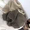 A striped kids cotton pullover sweatshirt in brown and cream is displayed on a white surface.