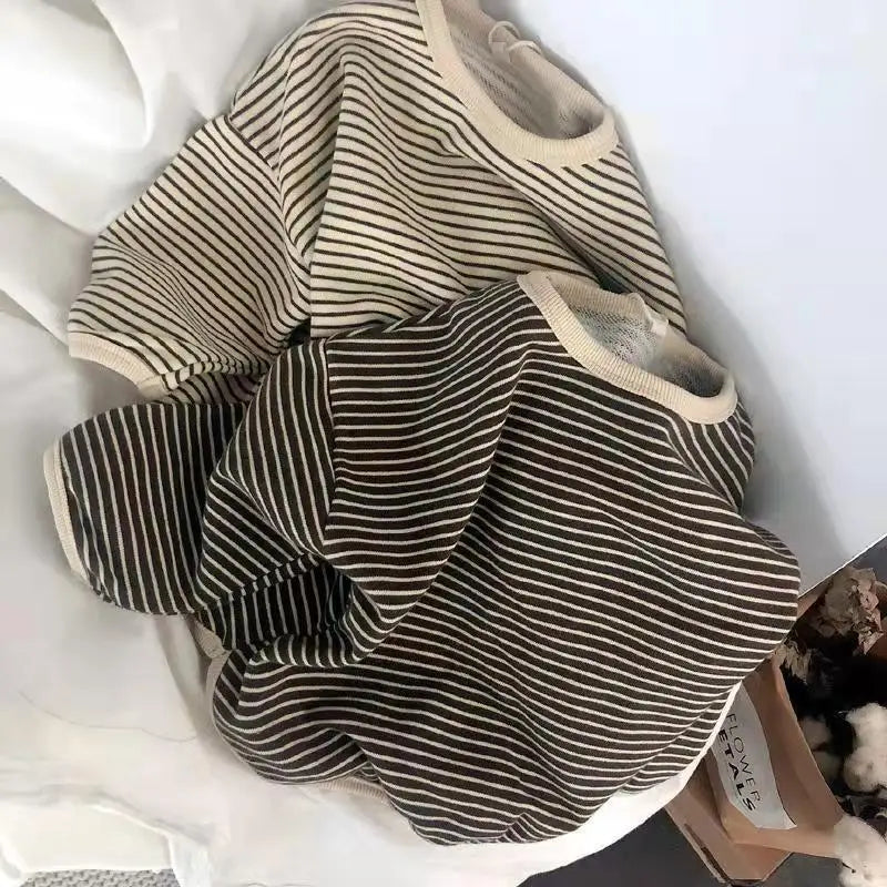 A striped kids cotton pullover sweatshirt in brown and cream is displayed on a white surface.
