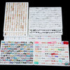 A collection of 100 pairs of assorted acrylic stud earrings featuring hearts, stars, moons, and various other designs.