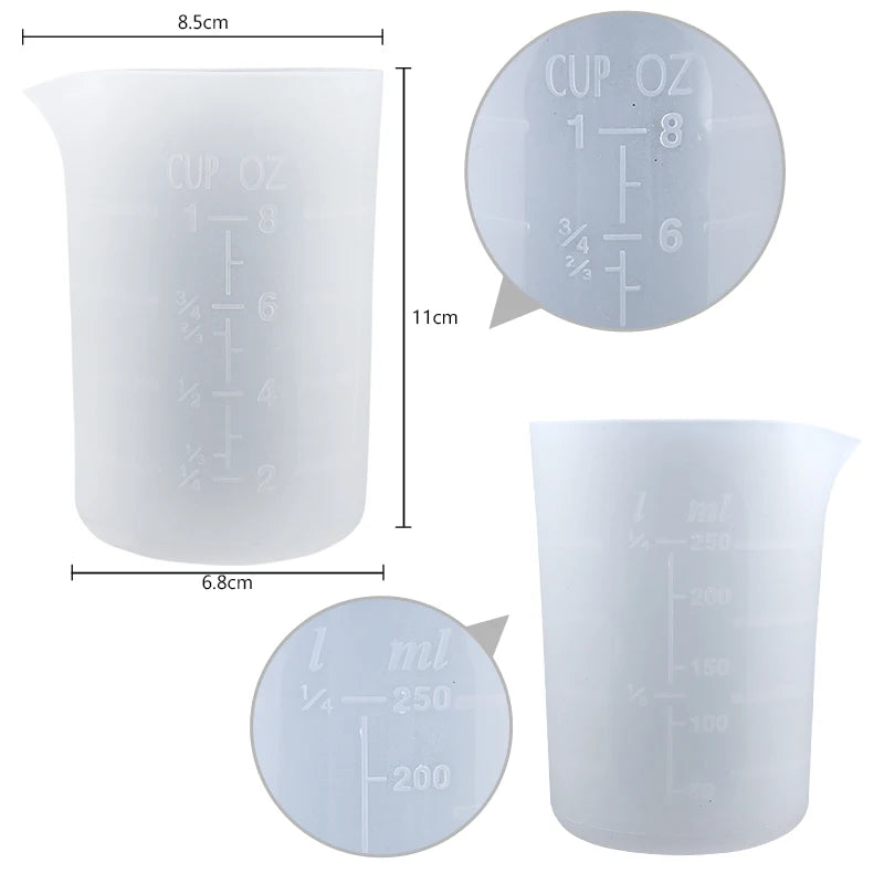 A clear silicone resin mixing tool kit showing various measuring cups and stir sticks with volume markings.