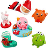 A collection of polymer clay figures including a Santa hat, an orange bear, a pink pig, and a green frog.