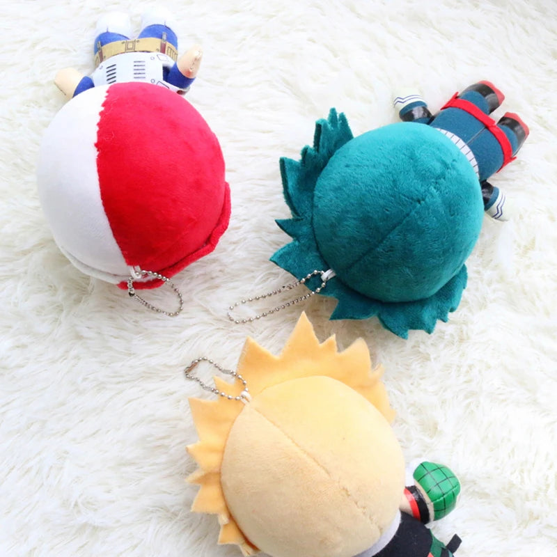 A collection of soft anime plush pendant dolls featuring characters like All Might and Deku.