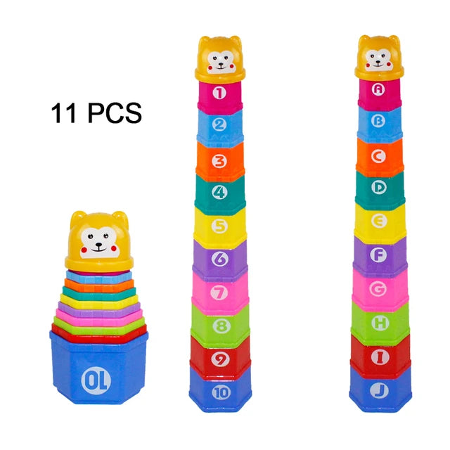 A set of 11 boat-shaped stacking cups in various colors and letters for toddlers