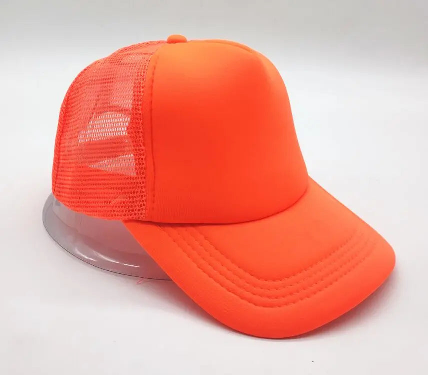 An orange trucker hat with a mesh front and a curved brim is shown against a white background.
