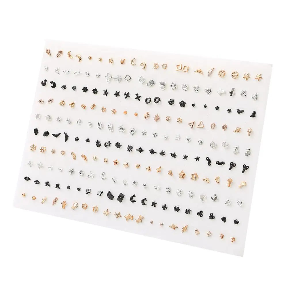 A collection of assorted acrylic stud earrings featuring hearts, stars, moons, and other designs.