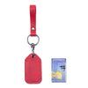 A red leather key wallet with a metal ring and a card holder featuring a yellow bear design.
