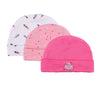 Three pink and white knitted baby hats featuring cute cartoon designs for infants