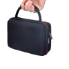 A hand is holding a black protective EVA hard case for audio interfaces.