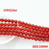 A string of 37 round, natural red carnelian beads, sized at 10mm, for jewelry making.