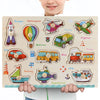 A wooden puzzle set featuring various vehicles and sea creatures like rockets, trucks, trains, boats, and submarines.