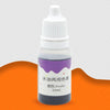 A small glass bottle containing purple liquid soap colorant dye labeled for use in purple color.