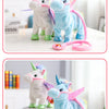 Two plush unicorn toys, one white and one blue, with pink accents, standing on a white surface.