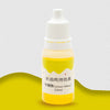 A small glass bottle of yellow liquid dye labeled Lemon Yellow for use in hair color, with a white dropper cap.